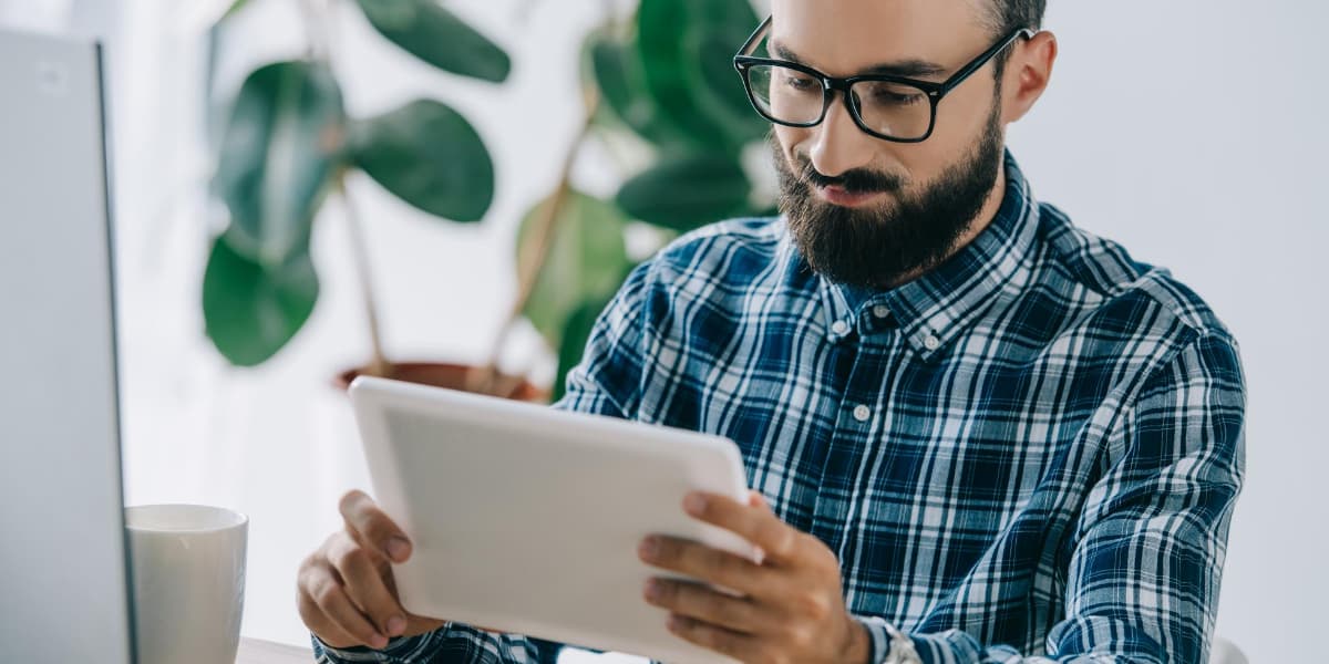 man reviewing keyword rankings