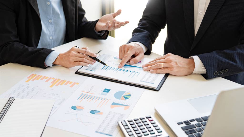 Business people analysing SEO metrics
