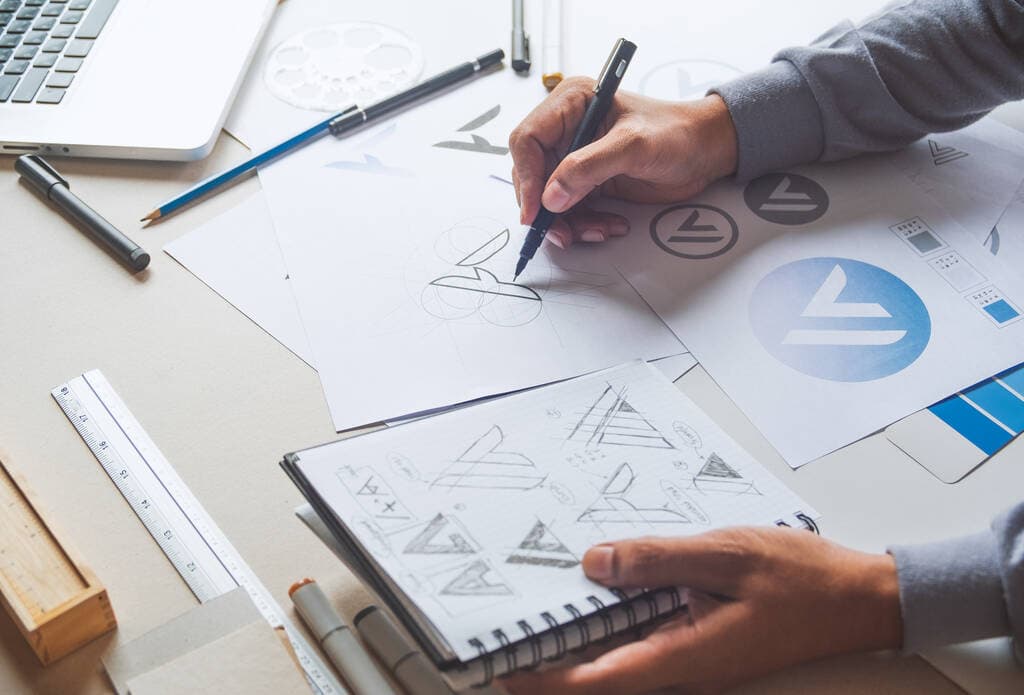 brand designer creating logo concepts