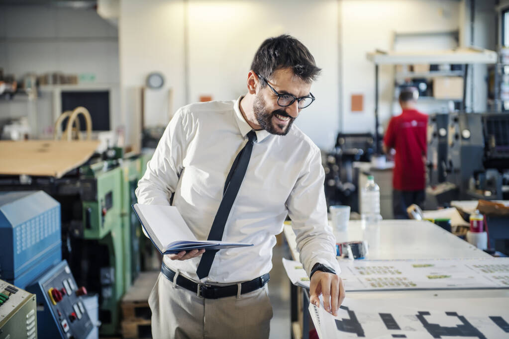 an employee in a printing company