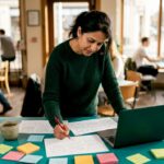 UX designer reviewing website accessibility wireframes