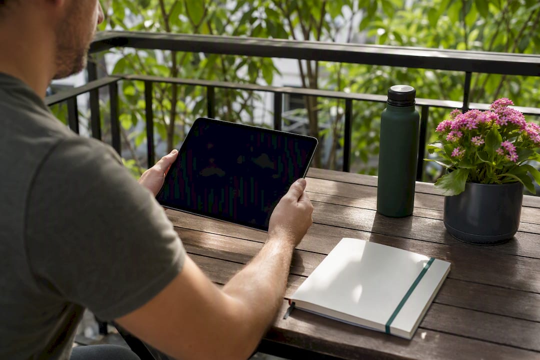 Hands holding tablet device preparing validation